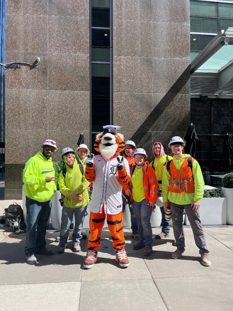 Rival Insulation field team with the Detroit Tigers mascot